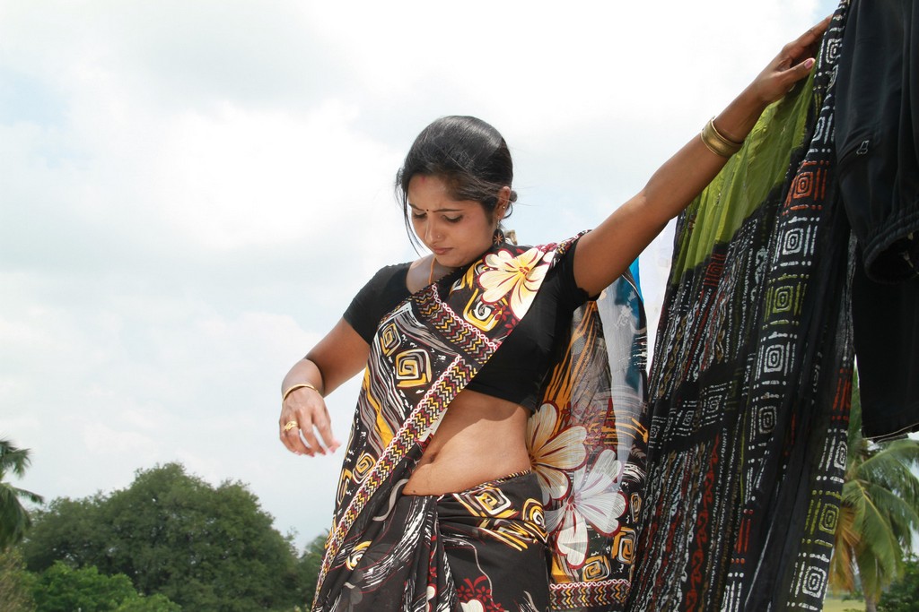 Madhuram Movie Hot Photos